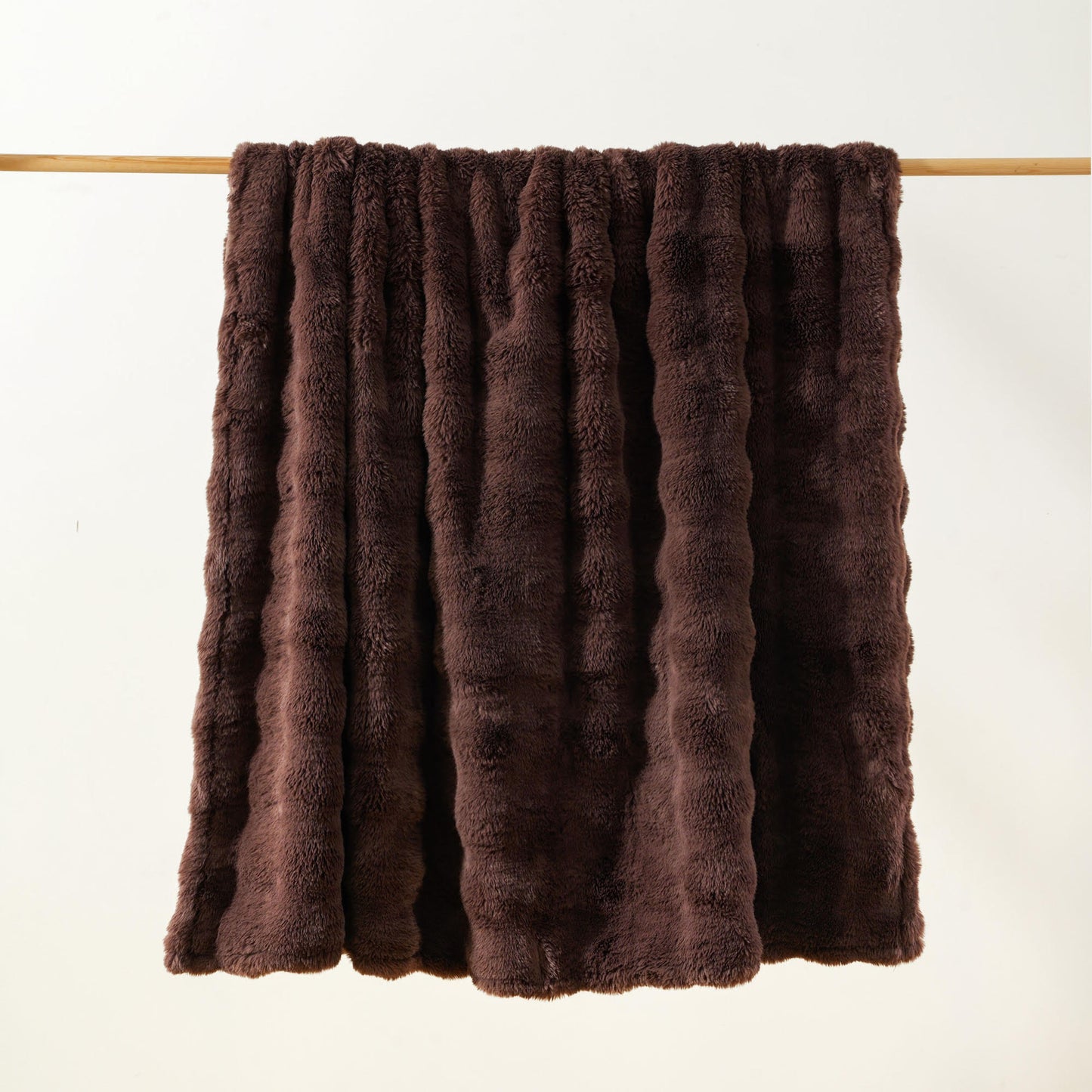 Brook Snuggle minky blanket Espresso colorway hanging lightly bubbled ultra soft texture medium weight Wrapped in Love Pocket Love Movement