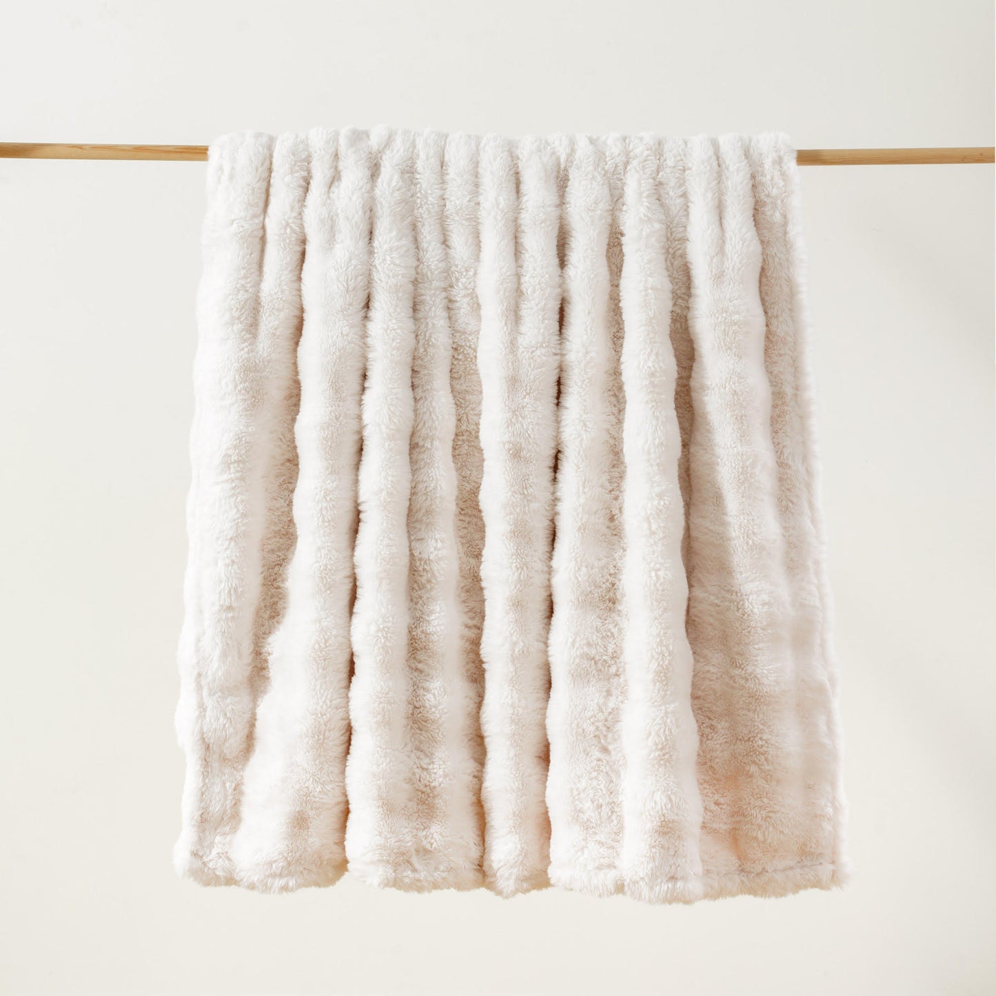 Brook Snuggle minky blanket Offwhite colorway hanging lightly bubbled ultra soft texture medium weight Wrapped in Love Pocket Love Movement