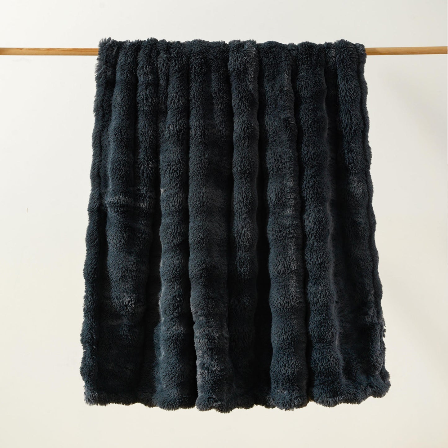 Brook Snuggle minky blanket slate colorway hanging lightly bubbled ultra soft texture medium weight Wrapped in Love Pocket Love Movement